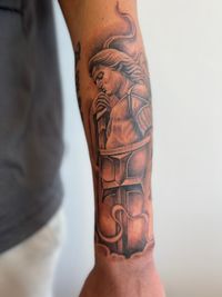 Een tattoo van Saint Micheal